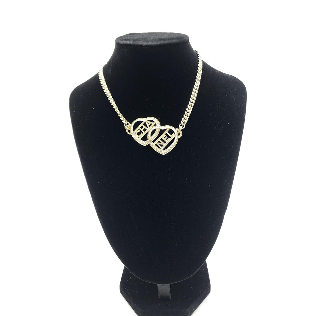 Goudkleurige Chokerketting Met Hartje En Logo