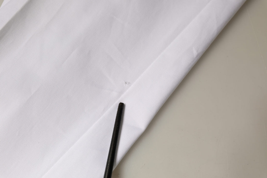 Witte katoenen spijkerbroek met taps toelopende pijpen en middelhoge taille
