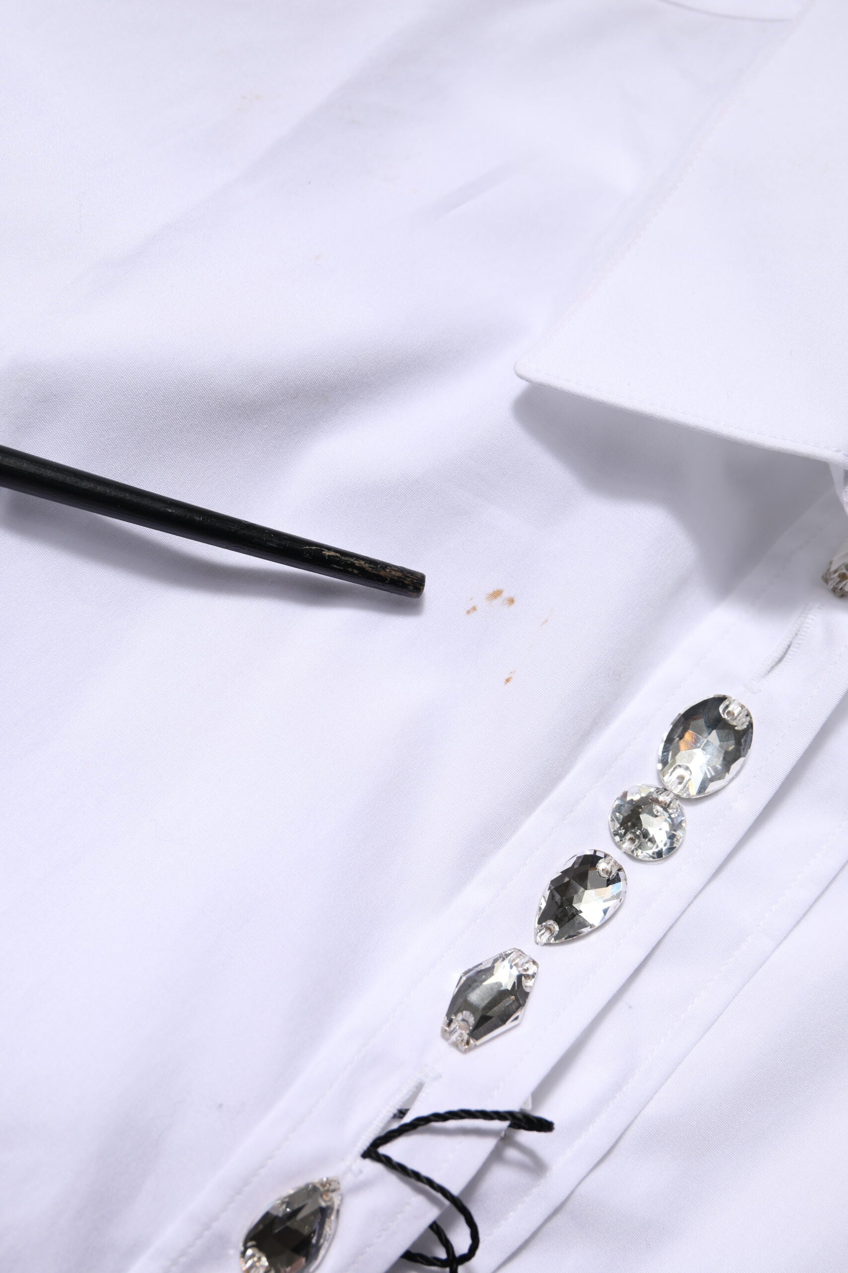 Witte top met lange mouwen en strass-steentjes