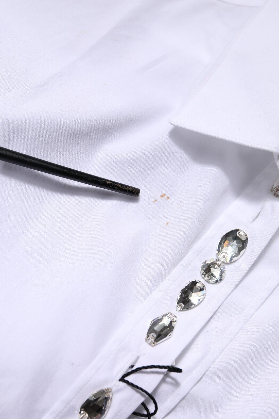 Witte top met lange mouwen en strass-steentjes