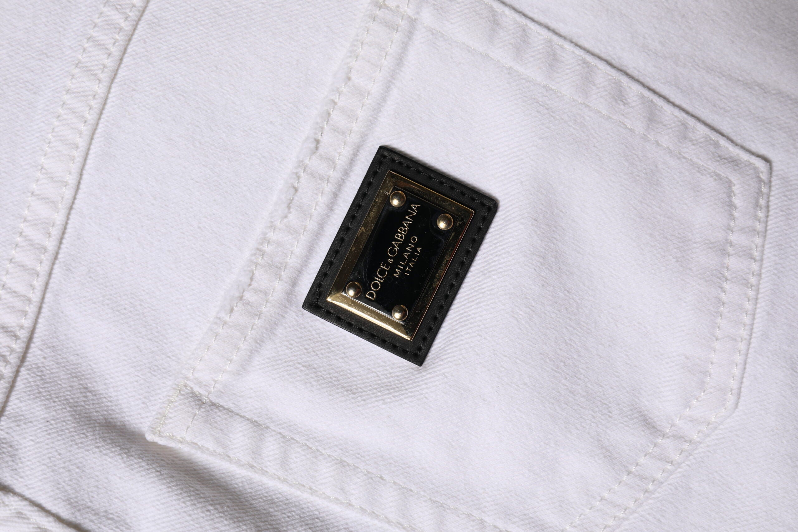 Witte katoenen spijkerbroek met hoge taille en rechte pijpen
