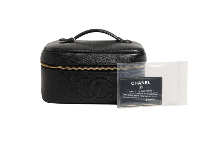 Chanel Black and gold makeup bag - RIMODA