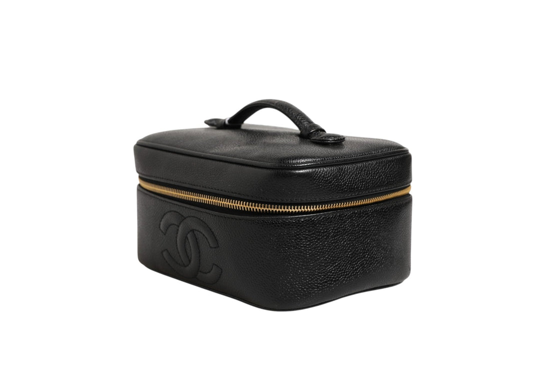 Chanel Black and gold makeup bag - RIMODA