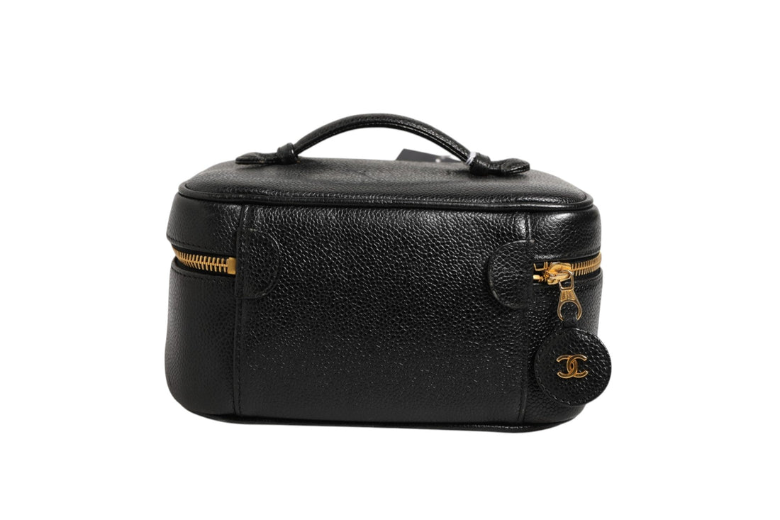 Chanel Black and gold makeup bag - RIMODA
