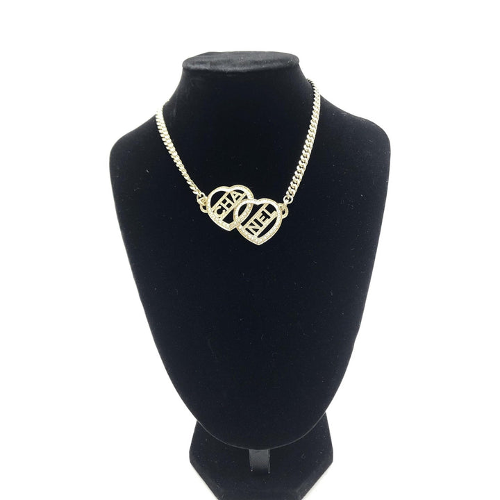 Chanel Gold Tone Heart Choker Necklace With Logo - RIMODA