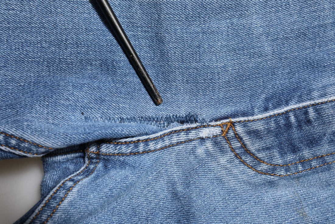 Dolce & Gabbana Blue Washed Tattered Logo Plaque Denim Jeans - RIMODA