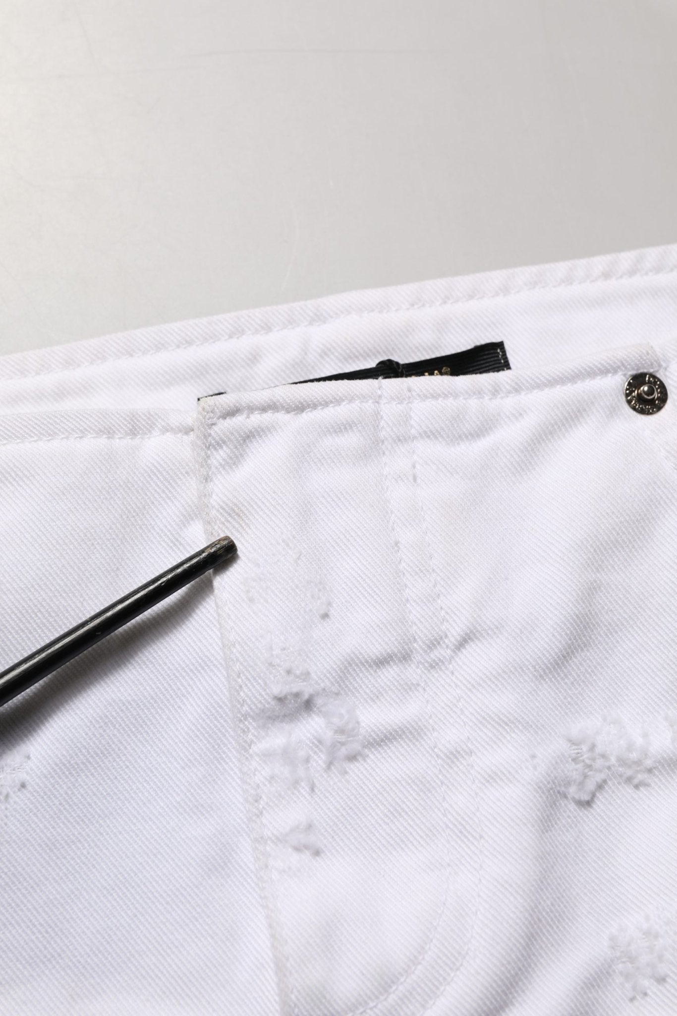 Dolce & Gabbana White Distressed Cotton Denim Mini Skirt - RIMODA