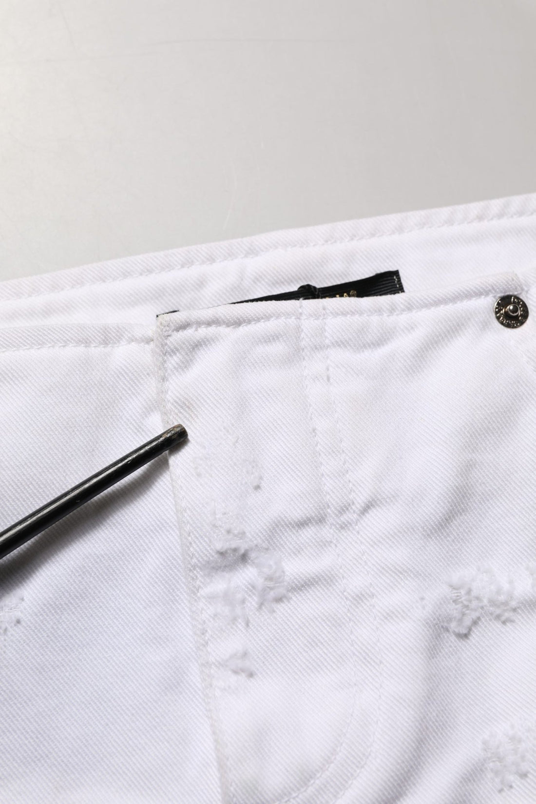 Dolce & Gabbana White Distressed Cotton Denim Mini Skirt - RIMODA