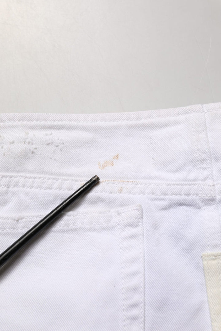 Dolce & Gabbana White Distressed Cotton Denim Mini Skirt - RIMODA