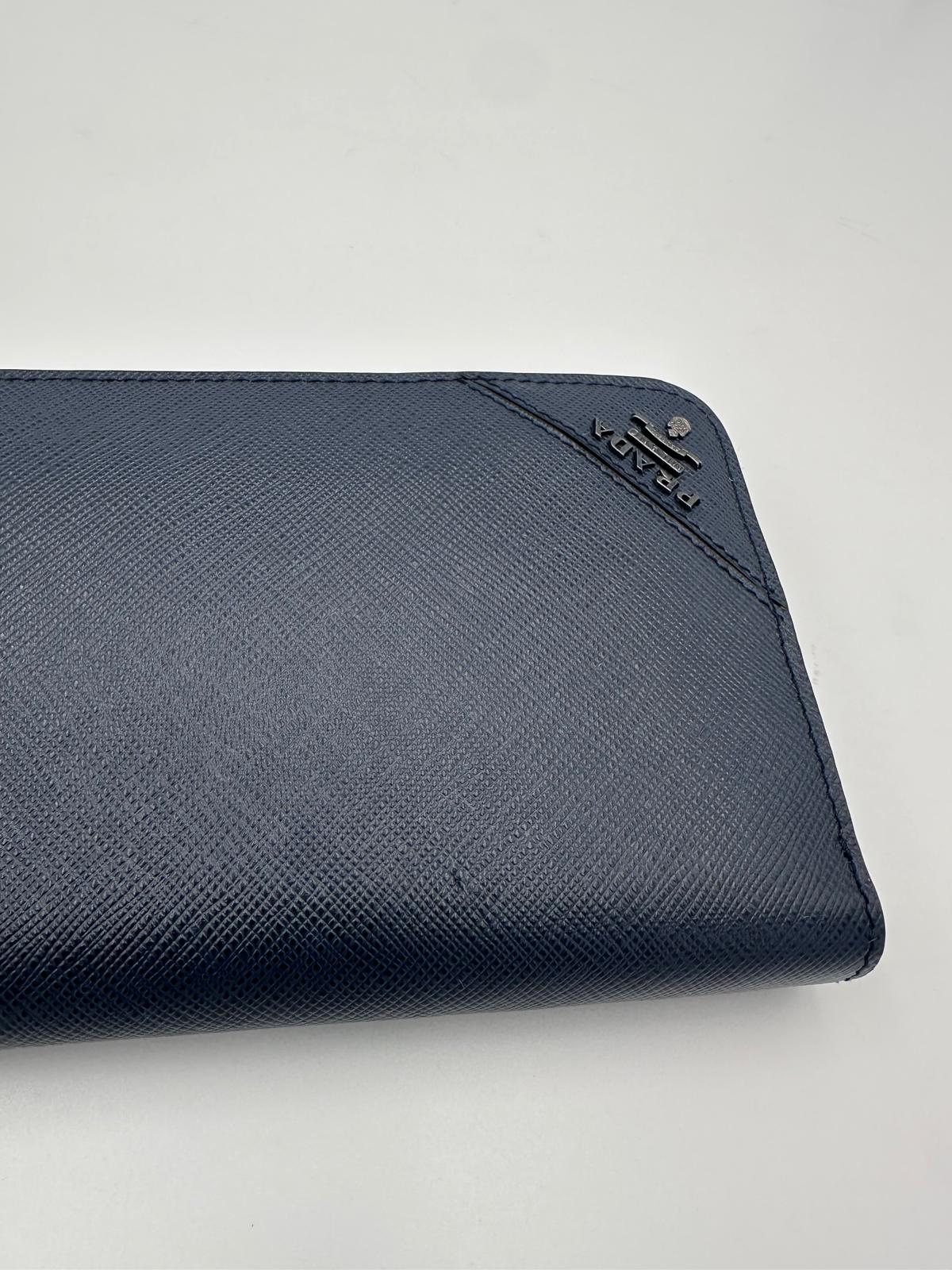 Prada PRADA Zip in Blue Saffiano Wallet - RIMODA